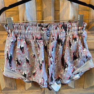 Lululemon track that size 10, 2 1/2 inch inseam. Fun pattern!